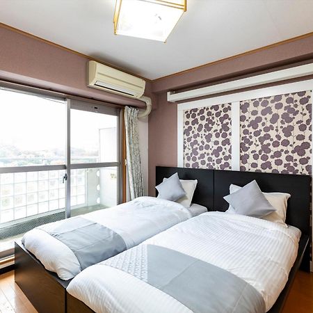 Ryokan Sinsekai - Tourpalace Osaka Bagian luar foto