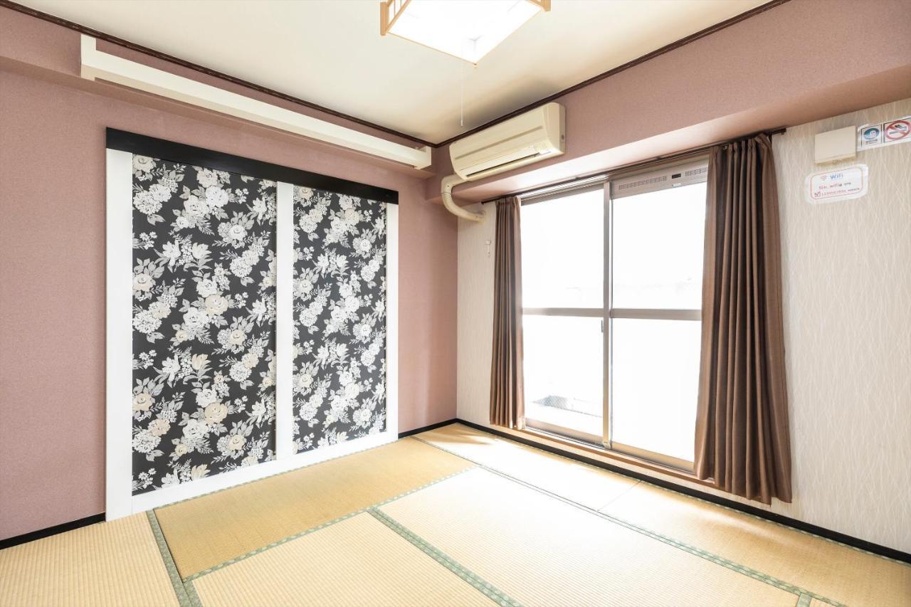 Ryokan Sinsekai - Tourpalace Osaka Bagian luar foto