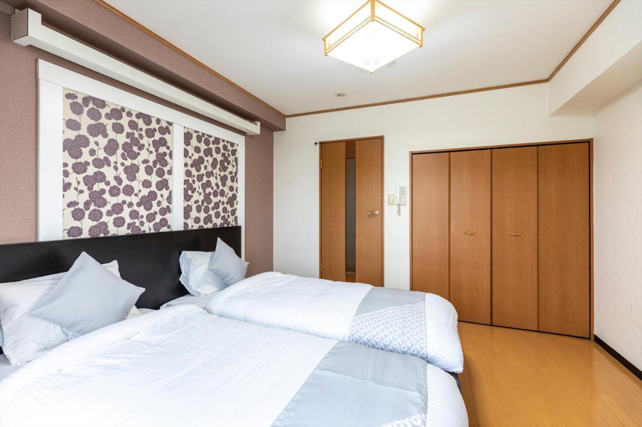 Ryokan Sinsekai - Tourpalace Osaka Bagian luar foto