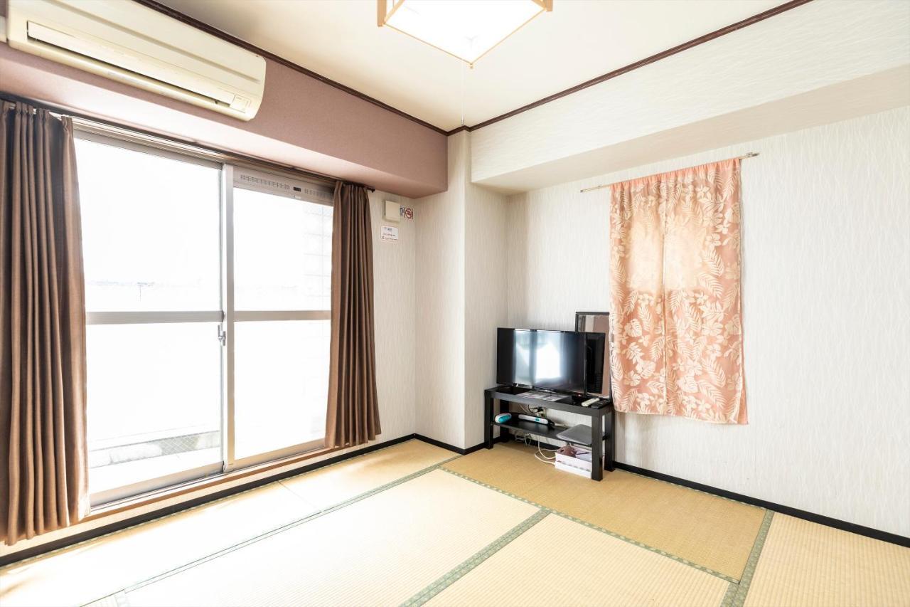 Ryokan Sinsekai - Tourpalace Osaka Bagian luar foto