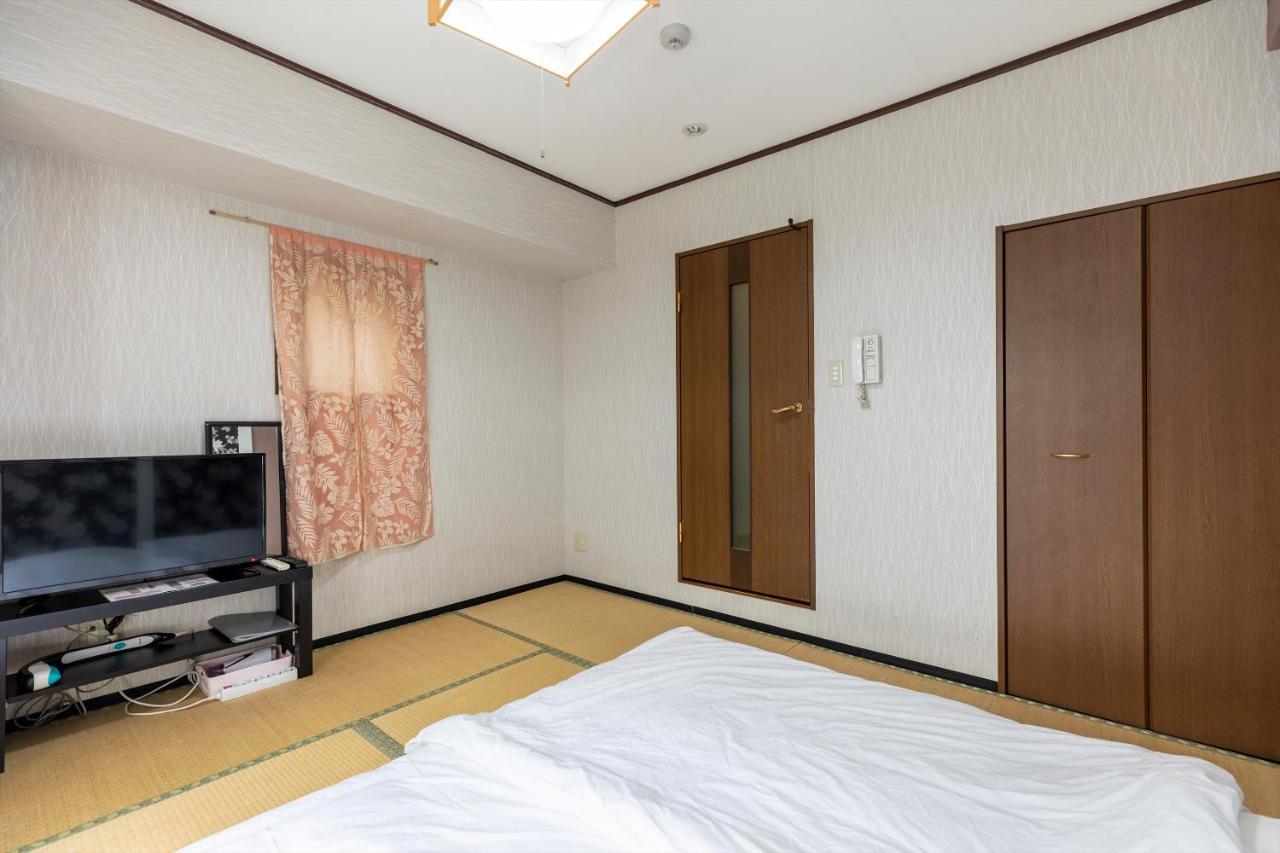 Ryokan Sinsekai - Tourpalace Osaka Bagian luar foto