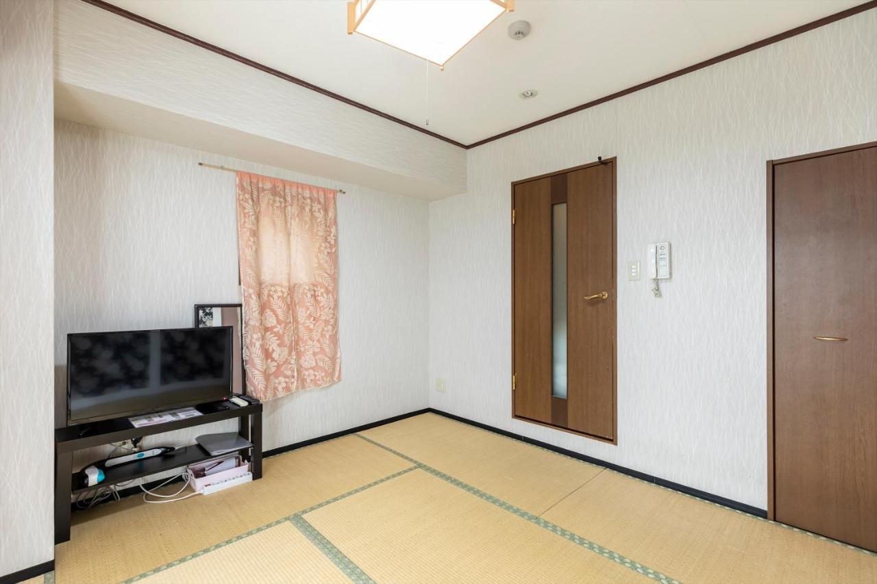 Ryokan Sinsekai - Tourpalace Osaka Bagian luar foto