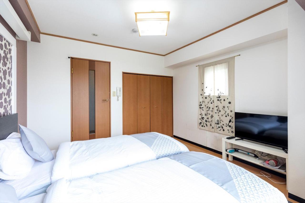 Ryokan Sinsekai - Tourpalace Osaka Bagian luar foto