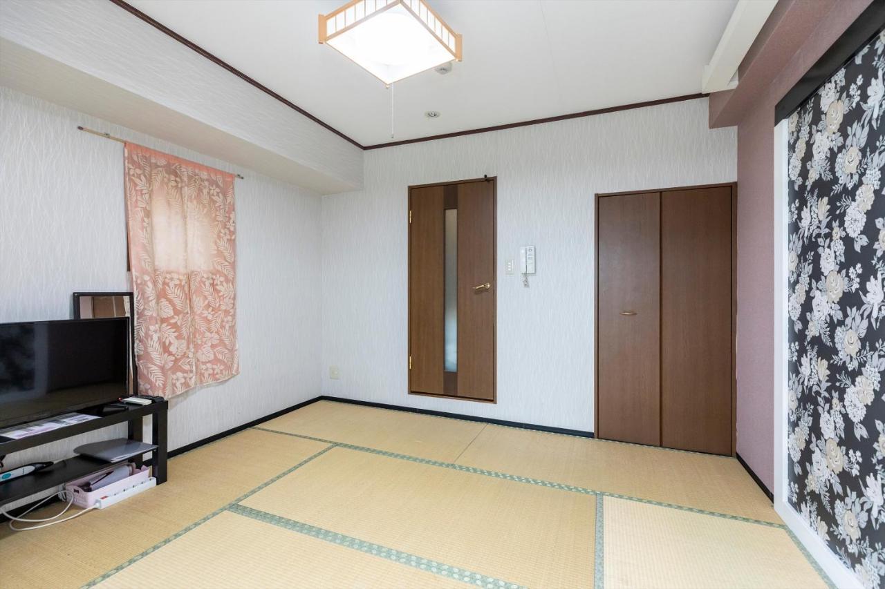 Ryokan Sinsekai - Tourpalace Osaka Bagian luar foto