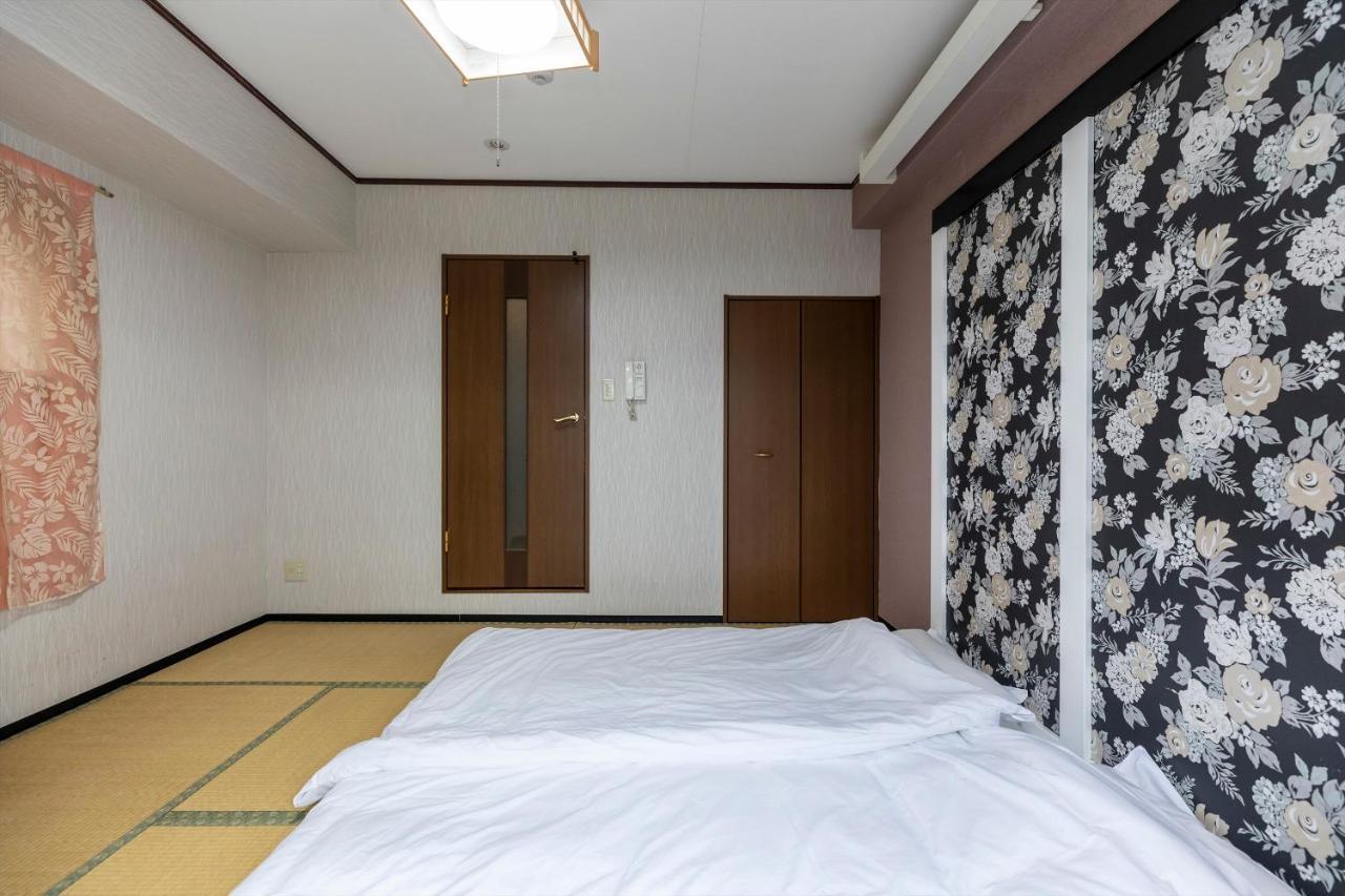 Ryokan Sinsekai - Tourpalace Osaka Bagian luar foto